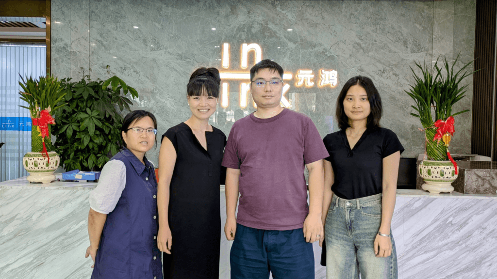 Xiaofeng and the team with a factory owner