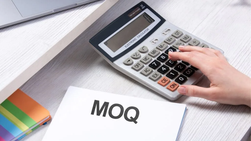 The image symbolizes the importance of understanding a factory's minimum order quantity to manage production costs and order requirements effectively.